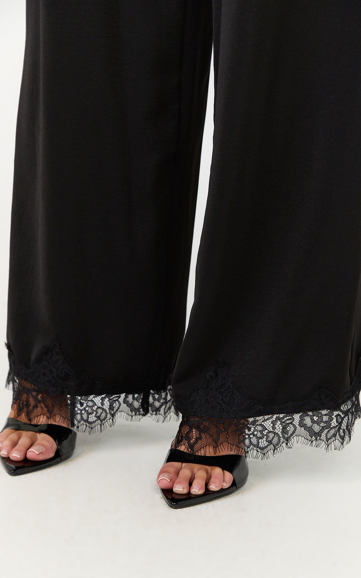 Ava Pants - Mid Waist Relaxed Leg Lace Hem Pants in Black